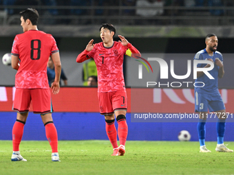 Son Heung Min (C) of Korea Republic is in action during the AFC Asian Qualifiers Road to 26 match between Kuwait and Korea Republic in Kuwai...