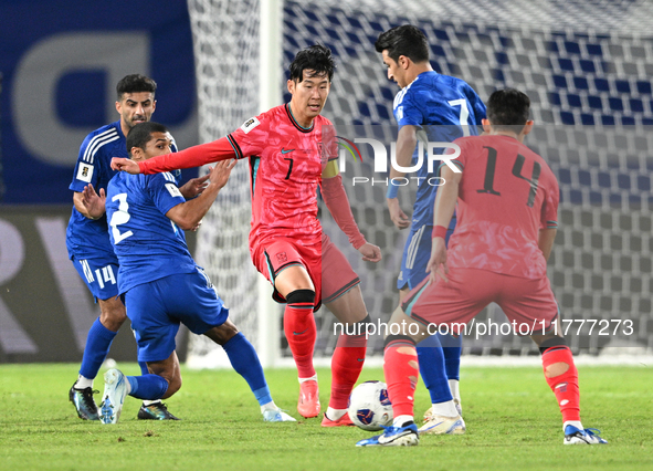 Son Heung Min (C) of Korea Republic is in action during the AFC Asian Qualifiers Road to 26 match between Kuwait and Korea Republic in Kuwai...