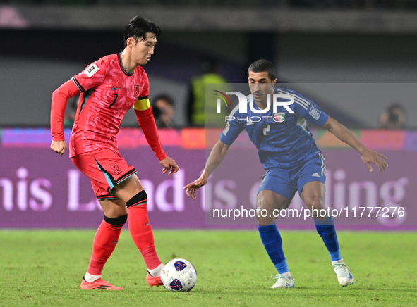 Sami Alsanea of Kuwait plays against Son Heung Min of Korea Republic during the AFC Asian Qualifiers Road to 26 match between Kuwait and Kor...