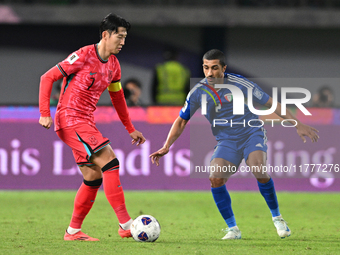 Sami Alsanea of Kuwait plays against Son Heung Min of Korea Republic during the AFC Asian Qualifiers Road to 26 match between Kuwait and Kor...