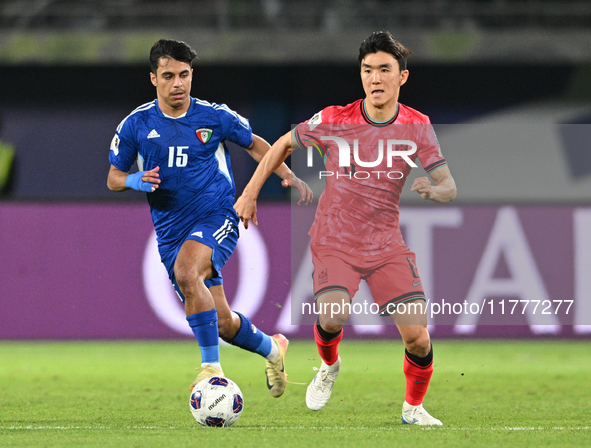 Yosef Alshammari of Kuwait competes against Hwang Inbeom of Korea Republic during the AFC Asian Qualifiers Road to 26 match between Kuwait a...