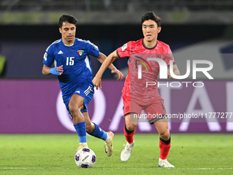 Yosef Alshammari of Kuwait competes against Hwang Inbeom of Korea Republic during the AFC Asian Qualifiers Road to 26 match between Kuwait a...