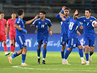 Players of Kuwait celebrate after scoring a goal during the AFC Asian Qualifiers Road to 26 match between Kuwait and Korea Republic in Kuwai...