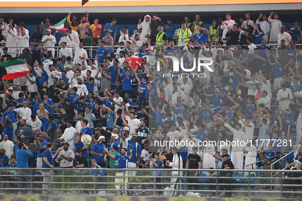 Fans are in action during the AFC Asian Qualifiers Road to 26 match between Kuwait and Korea Republic in Kuwait City, Kuwait, on November 14...