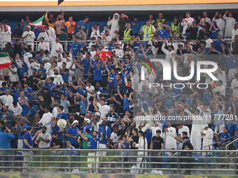 Fans are in action during the AFC Asian Qualifiers Road to 26 match between Kuwait and Korea Republic in Kuwait City, Kuwait, on November 14...