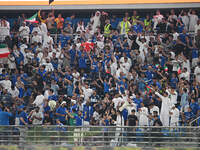 Fans are in action during the AFC Asian Qualifiers Road to 26 match between Kuwait and Korea Republic in Kuwait City, Kuwait, on November 14...