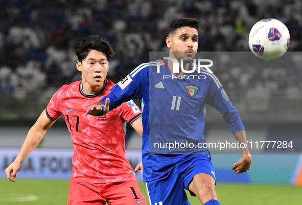 Eid Alrashidi of Kuwait competes against Bae Junho of Korea Republic during the AFC Asian Qualifiers Road to 26 match between Kuwait and Kor...