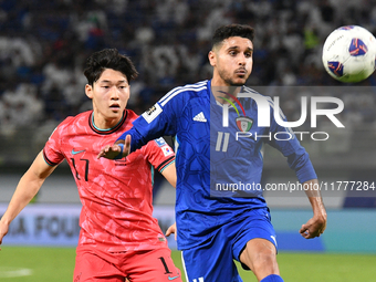 Eid Alrashidi of Kuwait competes against Bae Junho of Korea Republic during the AFC Asian Qualifiers Road to 26 match between Kuwait and Kor...