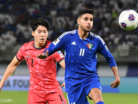 Eid Alrashidi of Kuwait competes against Bae Junho of Korea Republic during the AFC Asian Qualifiers Road to 26 match between Kuwait and Kor...