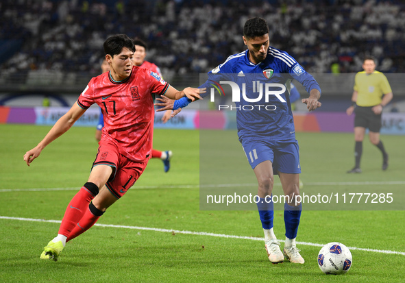 Eid Alrashidi of Kuwait competes against Bae Junho of Korea Republic during the AFC Asian Qualifiers Road to 26 match between Kuwait and Kor...