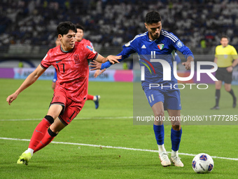 Eid Alrashidi of Kuwait competes against Bae Junho of Korea Republic during the AFC Asian Qualifiers Road to 26 match between Kuwait and Kor...