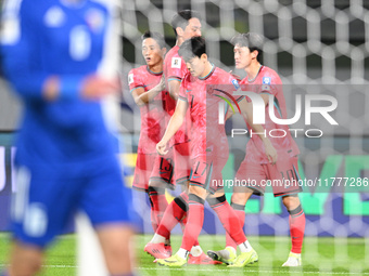 A player from Korea Republic celebrates after scoring a goal during the AFC Asian Qualifiers Road to 26 match between Kuwait and Korea Repub...