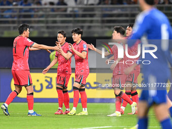 A player from Korea Republic celebrates after scoring a goal during the AFC Asian Qualifiers Road to 26 match between Kuwait and Korea Repub...