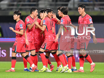 A player from Korea Republic celebrates after scoring a goal during the AFC Asian Qualifiers Road to 26 match between Kuwait and Korea Repub...