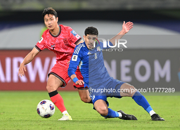 Moaath Aldhafiri of Kuwait competes against Paik Seungho of Korea Republic during the AFC Asian Qualifiers Road to 26 match between Kuwait a...