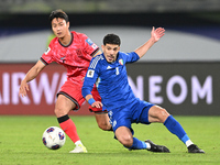 Moaath Aldhafiri of Kuwait competes against Paik Seungho of Korea Republic during the AFC Asian Qualifiers Road to 26 match between Kuwait a...