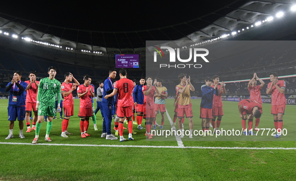 A player from Korea Republic celebrates after winning the match during the AFC Asian Qualifiers Road to 26 match between Kuwait and Korea Re...