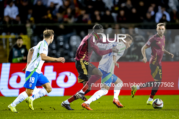 Belgium midfielder Amadou Onana and Italy forward Mateo Retegui play during the match between Belgium and Italy at the King Baudouin Stadium...