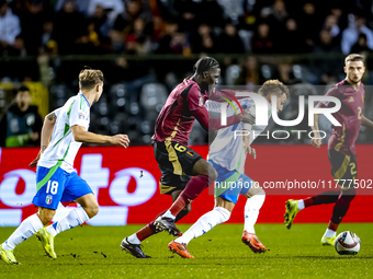 Belgium midfielder Amadou Onana and Italy forward Mateo Retegui play during the match between Belgium and Italy at the King Baudouin Stadium...