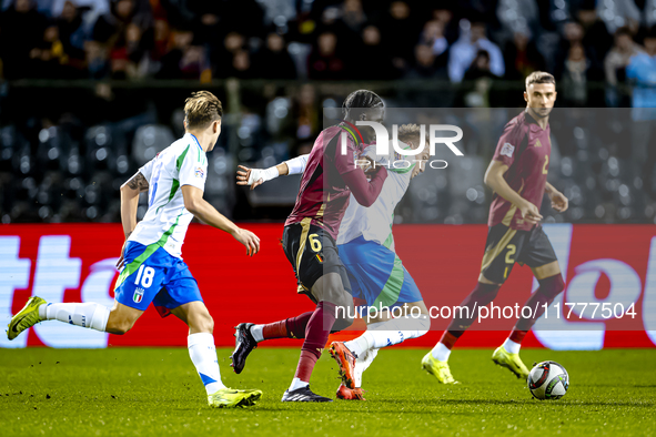 Belgium midfielder Amadou Onana and Italy forward Mateo Retegui play during the match between Belgium and Italy at the King Baudouin Stadium...