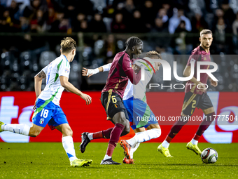 Belgium midfielder Amadou Onana and Italy forward Mateo Retegui play during the match between Belgium and Italy at the King Baudouin Stadium...