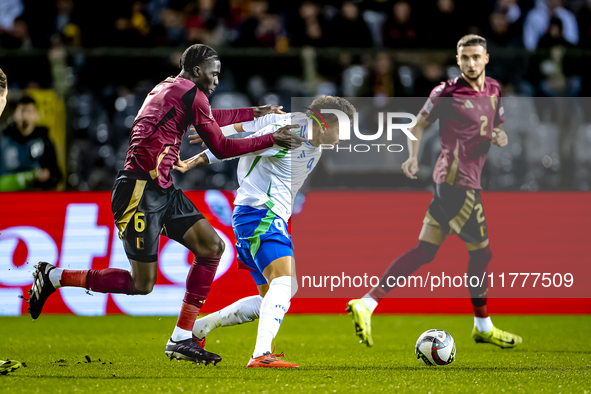 Belgium midfielder Amadou Onana and Italy forward Mateo Retegui play during the match between Belgium and Italy at the King Baudouin Stadium...