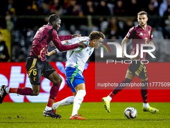 Belgium midfielder Amadou Onana and Italy forward Mateo Retegui play during the match between Belgium and Italy at the King Baudouin Stadium...