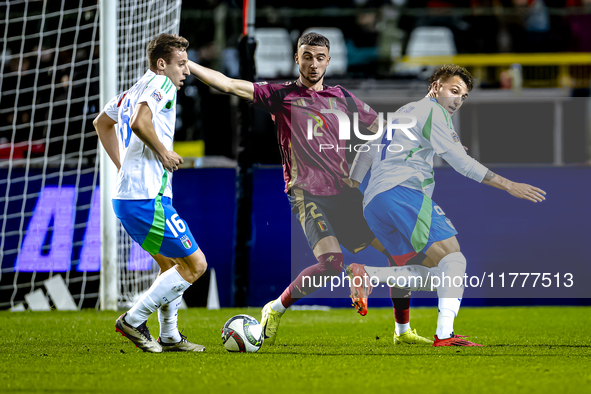 Belgium defender Zeno Debast and Italy forward Mateo Retegui play during the match between Belgium and Italy at the King Baudouin Stadium fo...