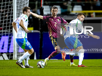 Belgium defender Zeno Debast and Italy forward Mateo Retegui play during the match between Belgium and Italy at the King Baudouin Stadium fo...