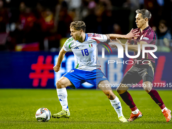 Italy midfielder Nicolo Barella and Belgium midfielder Leandro Trossard play during the match between Belgium and Italy at the King Baudouin...