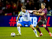 Italy midfielder Nicolo Barella and Belgium midfielder Leandro Trossard play during the match between Belgium and Italy at the King Baudouin...