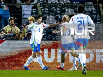 Italy midfielder Sandro Tonali scores the 0-1 and celebrates the goal during the match between Belgium and Italy at the King Baudouin Stadiu...