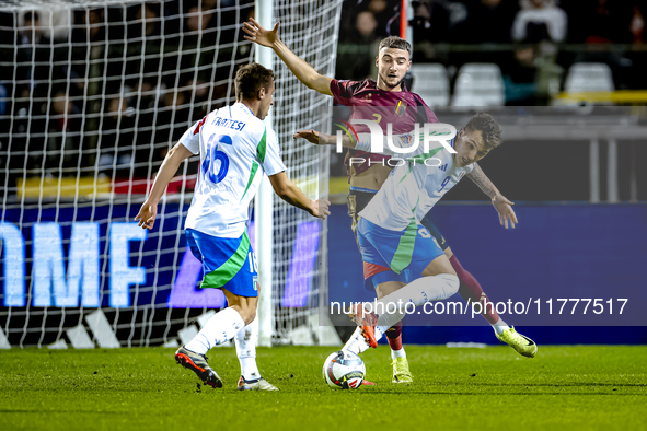 Belgium defender Zeno Debast and Italy forward Mateo Retegui play during the match between Belgium and Italy at the King Baudouin Stadium fo...