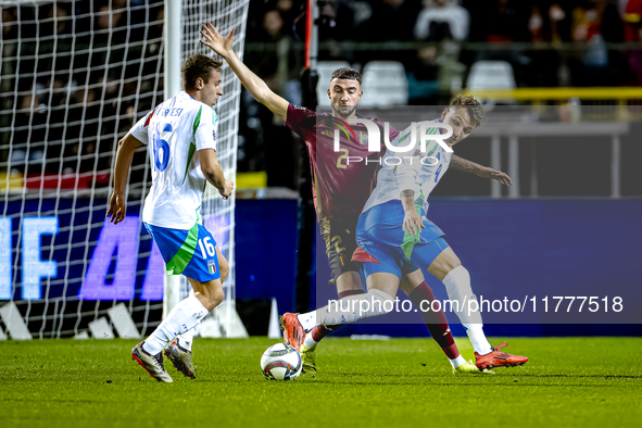 Belgium defender Zeno Debast and Italy forward Mateo Retegui play during the match between Belgium and Italy at the King Baudouin Stadium fo...