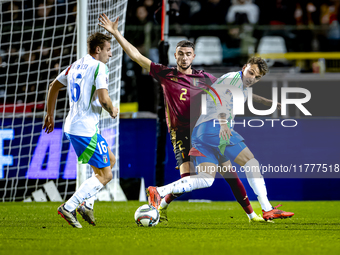 Belgium defender Zeno Debast and Italy forward Mateo Retegui play during the match between Belgium and Italy at the King Baudouin Stadium fo...