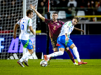 Belgium defender Zeno Debast and Italy forward Mateo Retegui play during the match between Belgium and Italy at the King Baudouin Stadium fo...