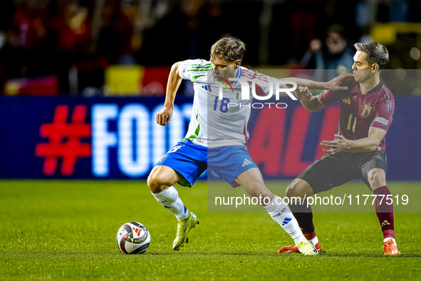 Italy midfielder Nicolo Barella and Belgium midfielder Leandro Trossard play during the match between Belgium and Italy at the King Baudouin...