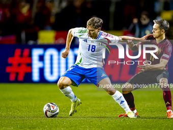 Italy midfielder Nicolo Barella and Belgium midfielder Leandro Trossard play during the match between Belgium and Italy at the King Baudouin...