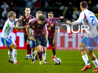 Italy defender Matteo Gabbia and Belgium midfielder Maxim de Cuyper participate in the match between Belgium and Italy at the King Baudouin...