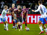 Italy defender Matteo Gabbia and Belgium midfielder Maxim de Cuyper participate in the match between Belgium and Italy at the King Baudouin...