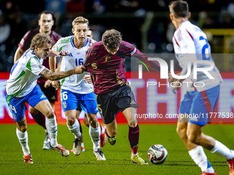 Italy defender Matteo Gabbia and Belgium midfielder Maxim de Cuyper participate in the match between Belgium and Italy at the King Baudouin...