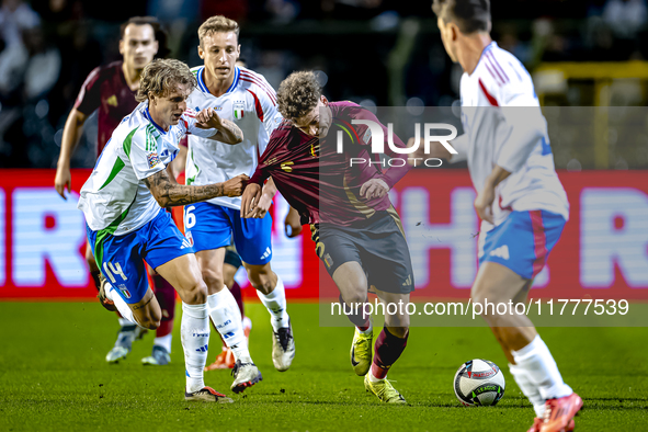 Italy defender Matteo Gabbia and Belgium midfielder Maxim de Cuyper participate in the match between Belgium and Italy at the King Baudouin...