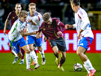 Italy defender Matteo Gabbia and Belgium midfielder Maxim de Cuyper participate in the match between Belgium and Italy at the King Baudouin...