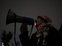 Demonstrators take part in a pro-Palestinian rally on the Place Du Front Populaire in Paris, France, on November 14, 2024, right before the...