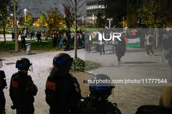 Demonstrators take part in a pro-Palestinian rally on the Place Du Front Populaire in Paris, France, on November 14, 2024, right before the...