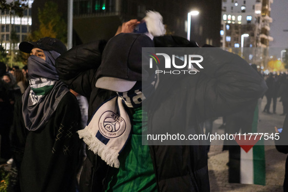 Demonstrators take part in a pro-Palestinian rally on the Place Du Front Populaire in Paris, France, on November 14, 2024, right before the...