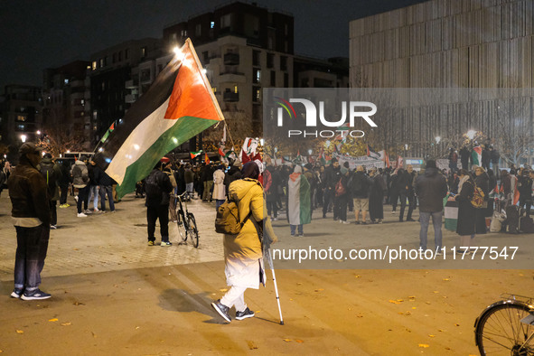 Demonstrators take part in a pro-Palestinian rally on the Place Du Front Populaire in Paris, France, on November 14, 2024, right before the...