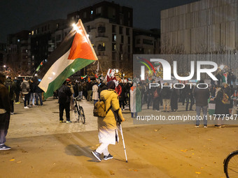 Demonstrators take part in a pro-Palestinian rally on the Place Du Front Populaire in Paris, France, on November 14, 2024, right before the...