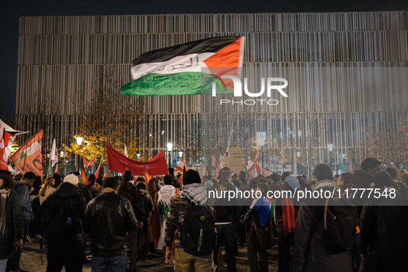 Demonstrators take part in a pro-Palestinian rally on the Place Du Front Populaire in Paris, France, on November 14, 2024, right before the...