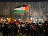 Demonstrators take part in a pro-Palestinian rally on the Place Du Front Populaire in Paris, France, on November 14, 2024, right before the...